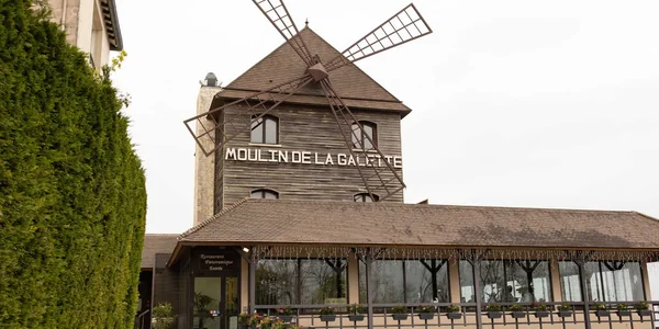 Façade et ailes du Moulin de la Galette à Sannois